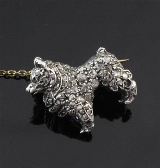 A Victorian gold and silver, rose cut diamond set dog brooch modelled as a Pomeranian, 0.75in.